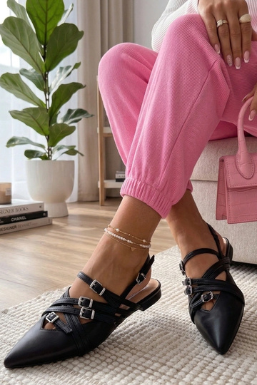 Ballerine nere con tacco...