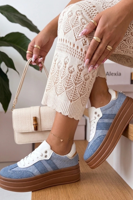 Scarpe sportive blu con platforma...