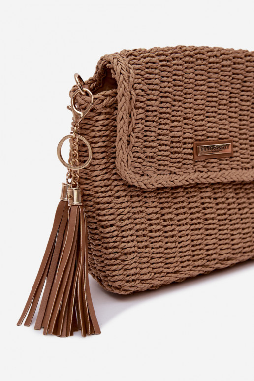 Una piccola borsetta Typu Postino con elementi traforati Deverrone Tamara