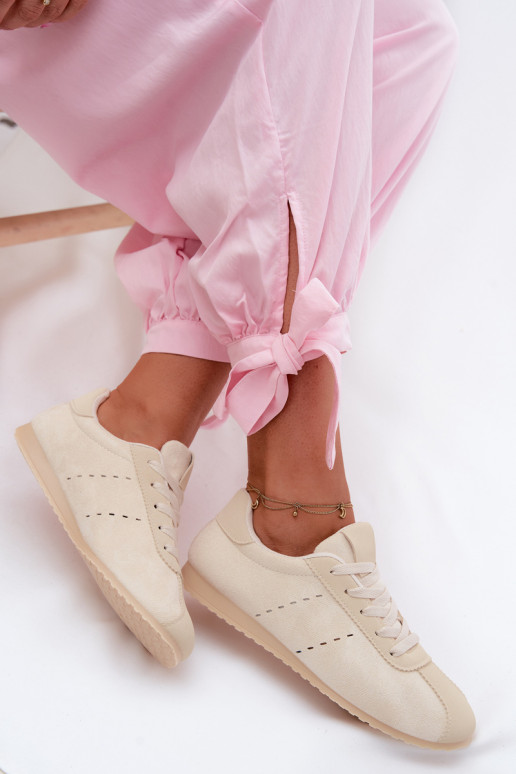 Scarpe modello sneakers Femminilein ecopelle scamosciatau Basso colore avorio Melvelin