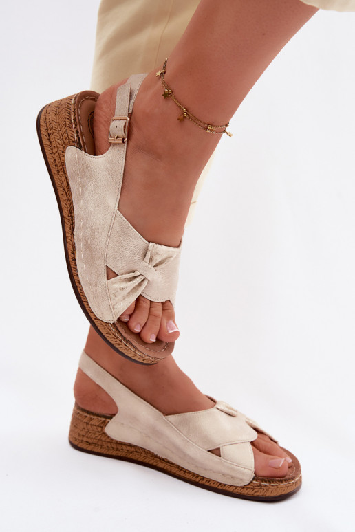 Comodi sandali da donna con una piattaforma colore dorato Iggy