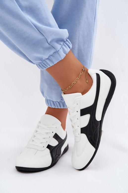 Scarpe bianche in stile sneaker per donne Tai