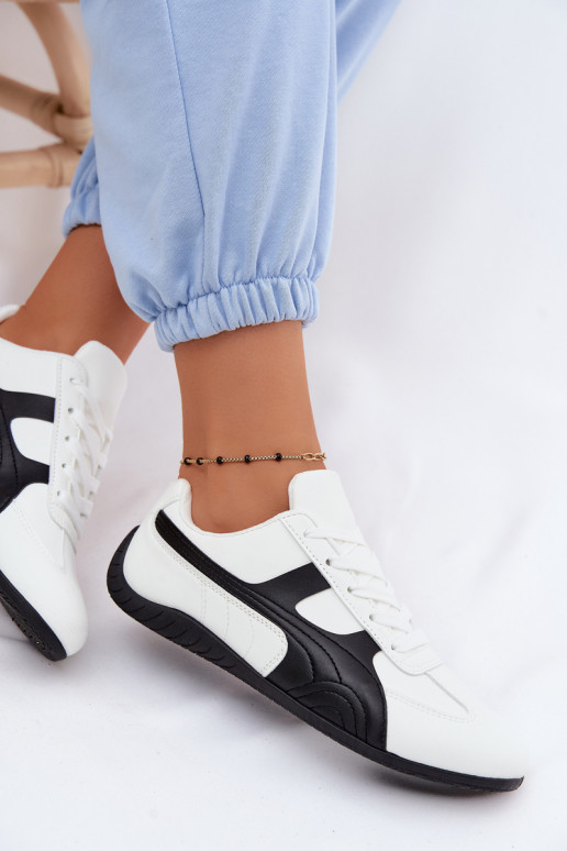 Scarpe bianche in stile sneaker per donne Tai
