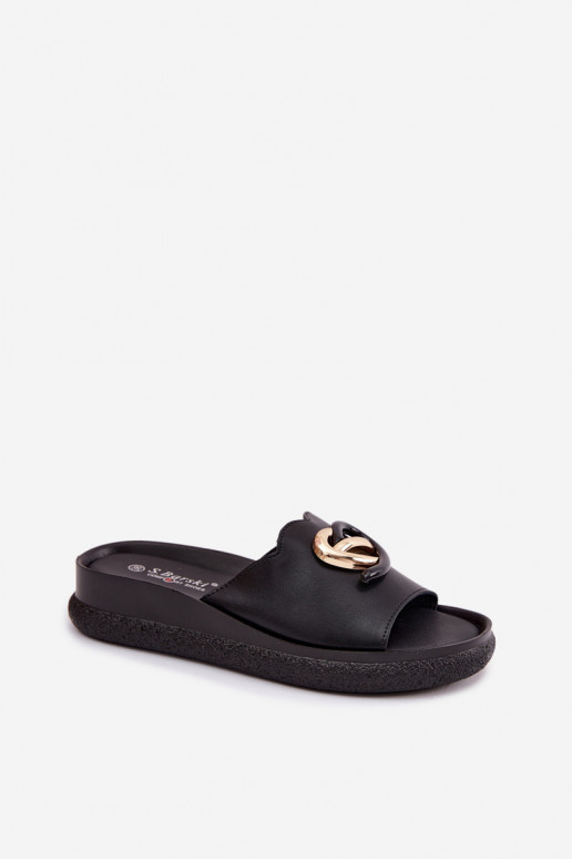 Ciabatte in pelle con dettagli decorativi in nero