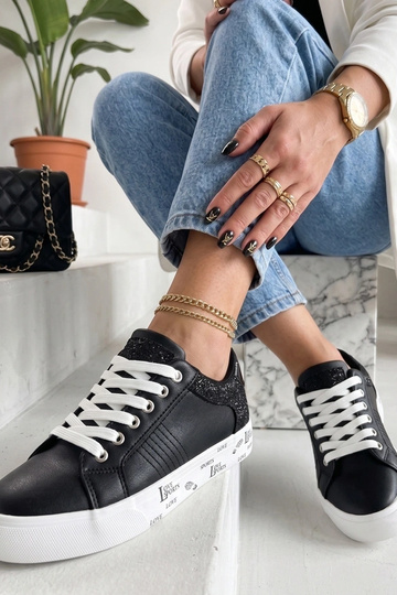 Sneakers neri con inserti decorativi Layla