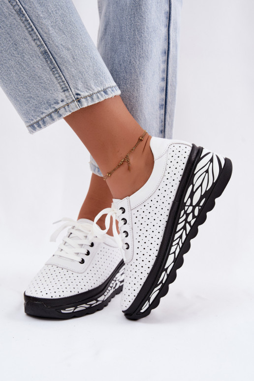 Scarpe bianche da donna con elementi traforati e piattaforma Morra