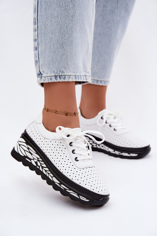 Scarpe bianche da donna con elementi traforati e piattaforma Morra
