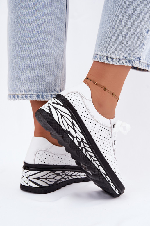 Scarpe bianche da donna con elementi traforati e piattaforma Morra