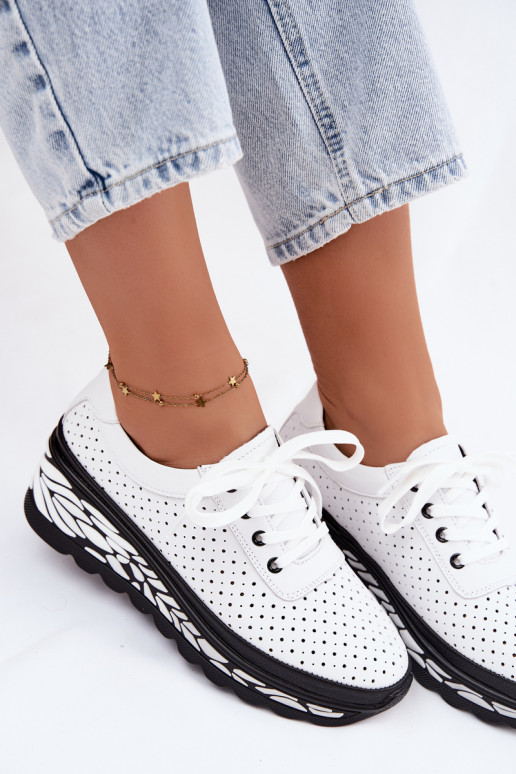 Scarpe bianche da donna con elementi traforati e piattaforma Morra