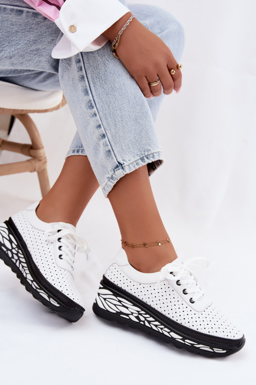 Scarpe bianche da donna con elementi traforati e piattaforma Morra