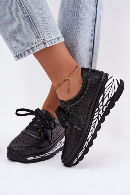 Scarpe nere da donna con elementi traforati e piattaforma Morra
