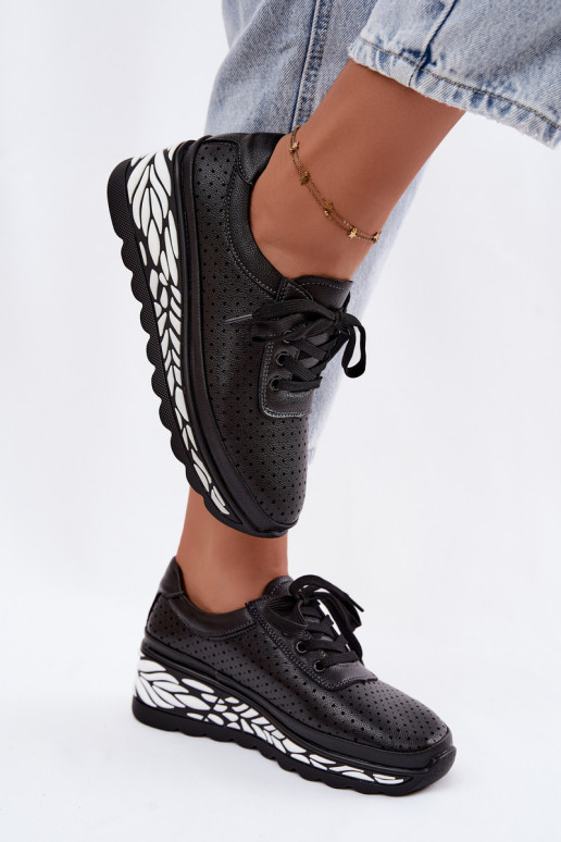 Scarpe nere da donna con elementi traforati e piattaforma Morra