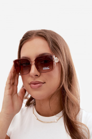 Occhiali da sole con dettagli decorativi in colore rosa