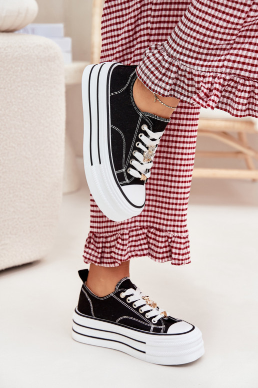 Scarpe casual con piattaforma in oro e nero Fiorina