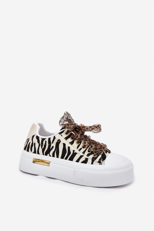 Scarpe casual con piattaforma e lacci decorativi in nero e sabbia Zidora
