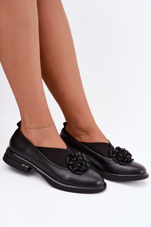 Scarpe in pelle da donna con ornamenti neri T.Sokolski