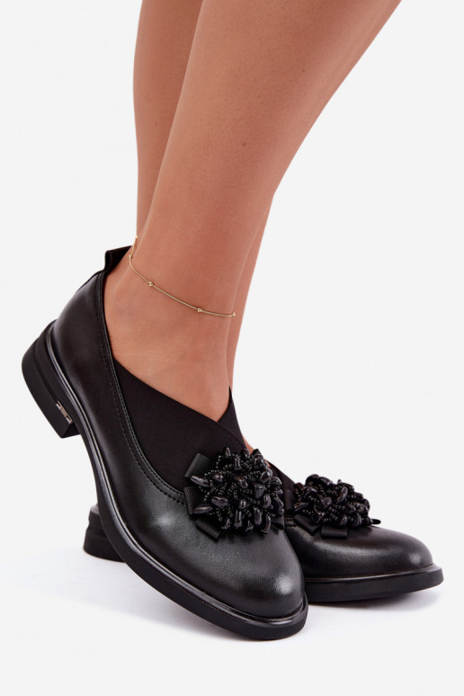 Scarpe in pelle da donna con ornamenti neri T.Sokolski