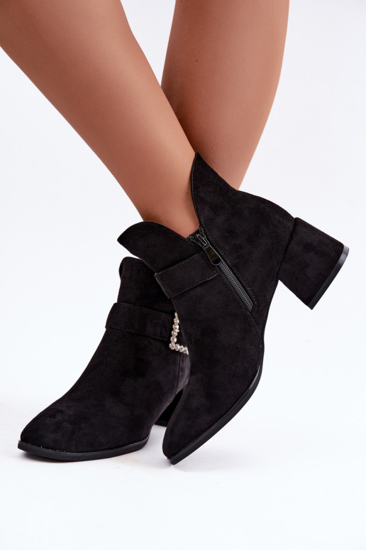 Stivaletti con cinturini e fibbia decorativa in nero Ameline