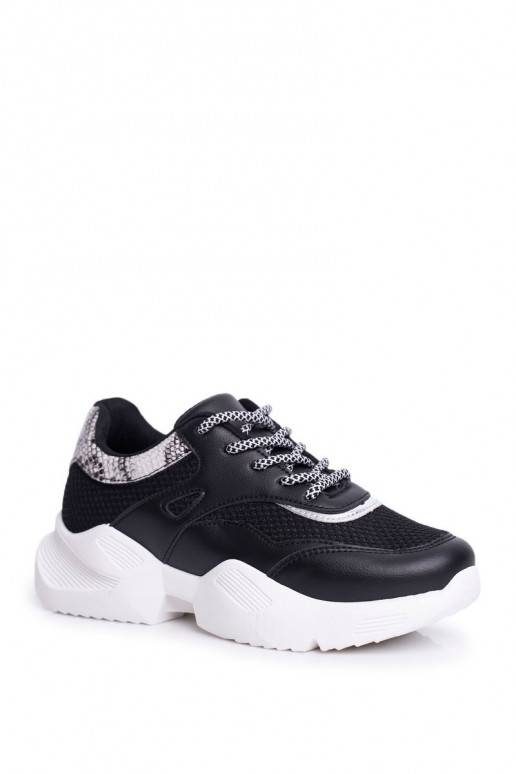 Scarpe in stile sportivo con imitazione pelle di serpente Giselle in nero