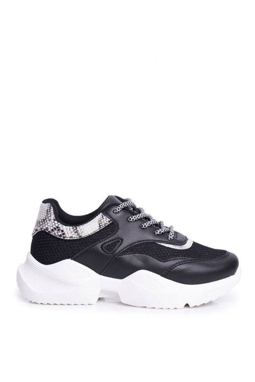 Scarpe in stile sportivo con imitazione pelle di serpente Giselle in nero