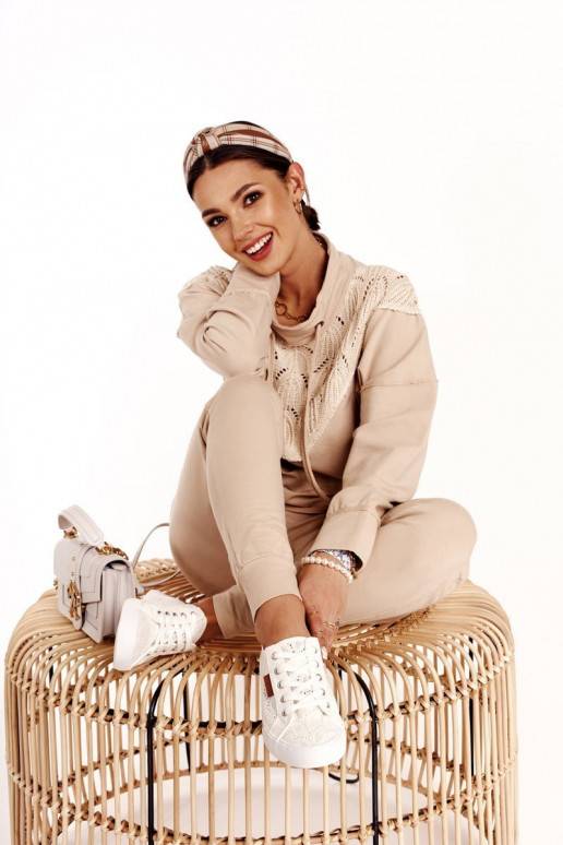 Sneakers bianche con motivi in pizzo Sneakers bianche con motivi in pizzo