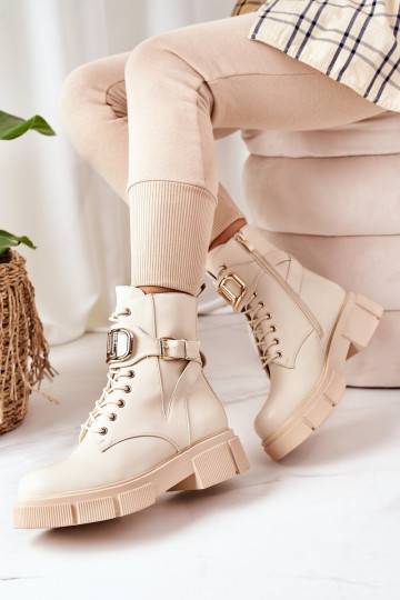 Stivali riscaldati con fibbie dorate in beige