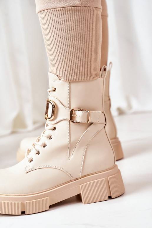 Stivali riscaldati con fibbie dorate in beige