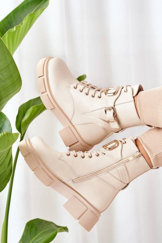 Stivali riscaldati con fibbie dorate in beige