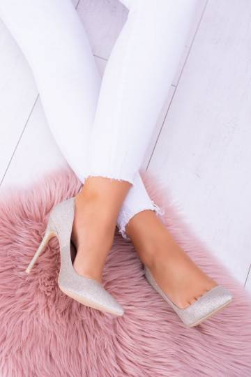 Scarpe lucide con tacco...