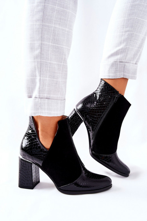 Stivali da donna con tacco in colore... Stivali da donna con tacco in colore...