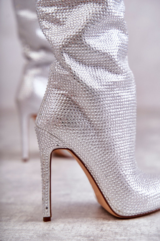 Stivali lunghi con tacco sottile...