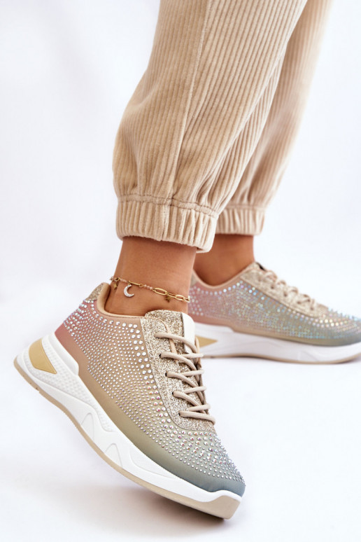 Sneakers lucide con occhielli scintillanti in vari colori