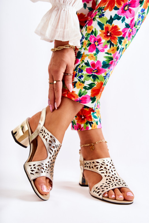 Sandali color oro con tacco color... Sandali color oro con tacco color...