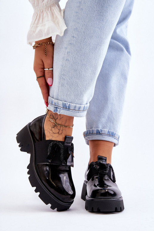 Scarpe in effetto laccato nero con...
