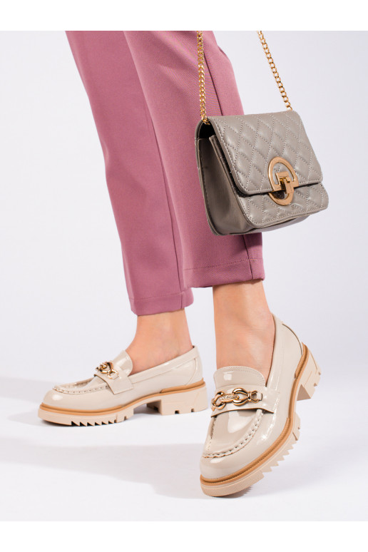 Stivaletti color sabbia con dettagli...