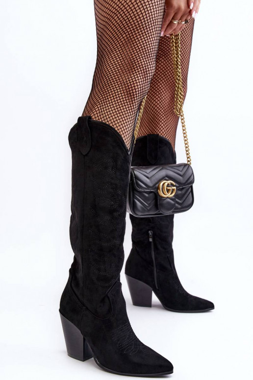 stivali lunghi in stile cowboy con... stivali lunghi in stile cowboy con...