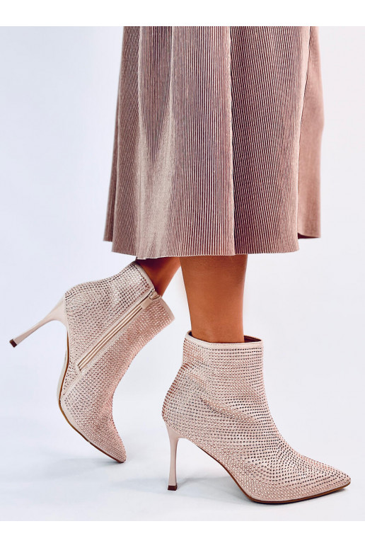 Stivali con tacco sottile con... Stivali con tacco sottile con...