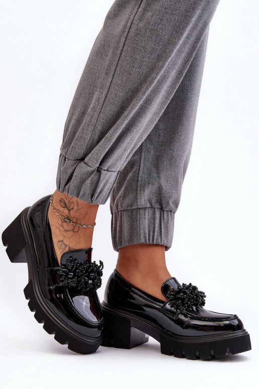 Scarpe da donna in vernice con... Scarpe da donna in vernice con...