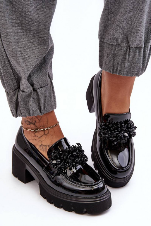 Scarpe da donna in vernice con... Scarpe da donna in vernice con...