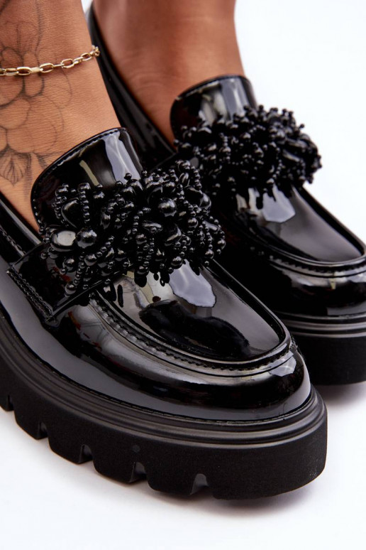 Scarpe da donna in vernice con... Scarpe da donna in vernice con...