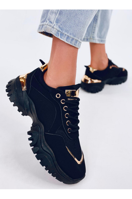 Scarpe stile sportivo in colore nero...