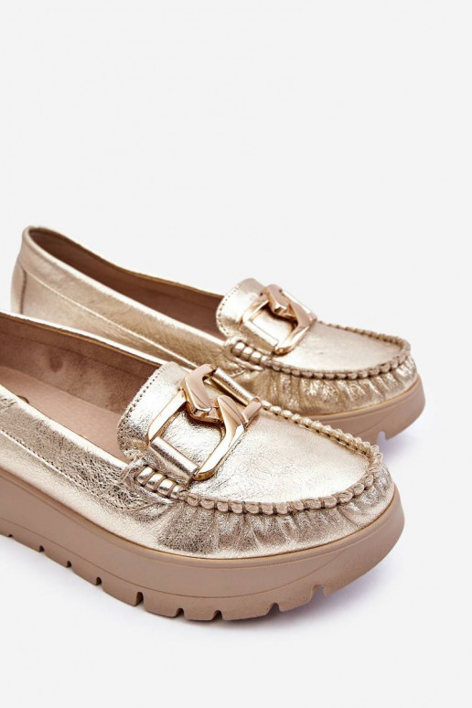 Mocassini con plateau decorati in oro di Lemar Desmond