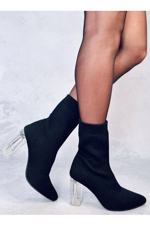 Stivali eleganti con tacco...