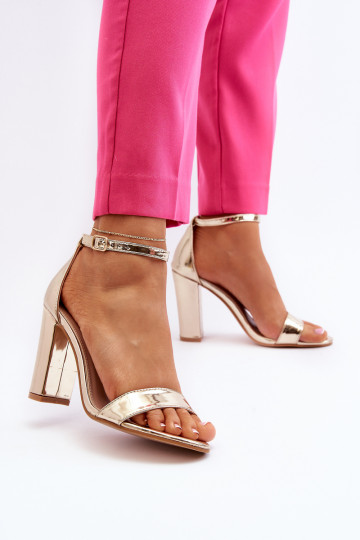 Sandali con tacco in colore oro Thakko