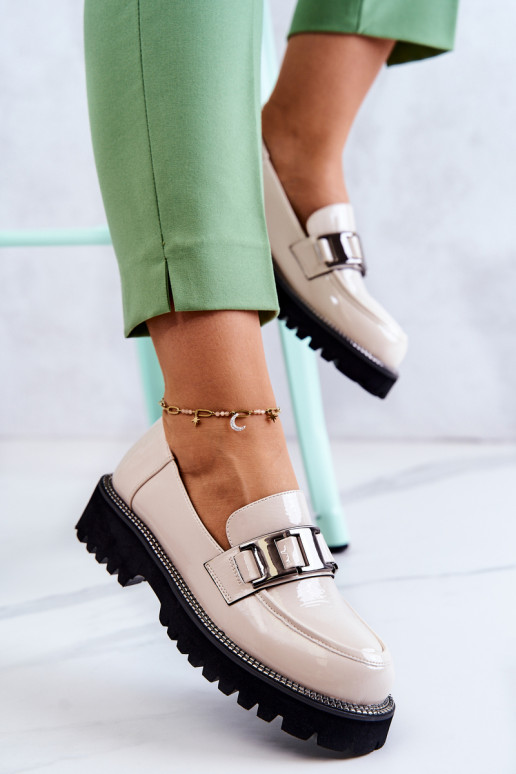 Scarpe con effetto vernice in avorio...