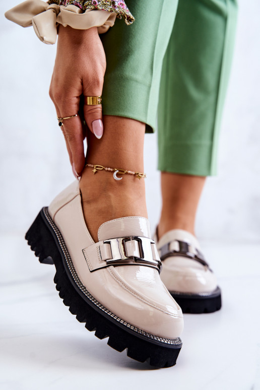 Scarpe con effetto vernice in avorio...