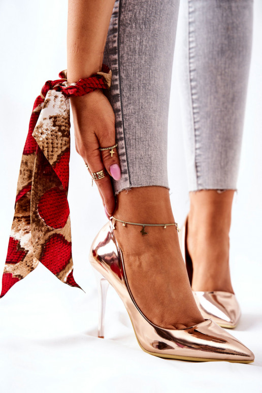 Eleganti scarpe con tacco effetto...