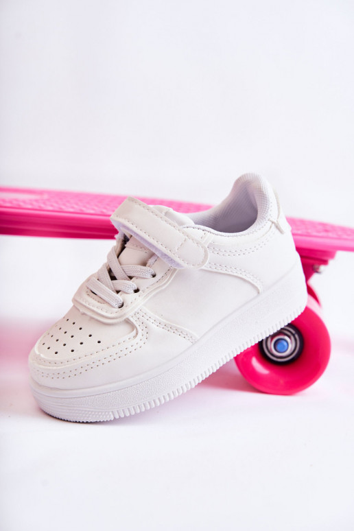 Scarpe sportive per bambini con chiusure adesive in colore bianco Elike Scarpe sportive per bambini con chiusure adesive in colore bianco Elike