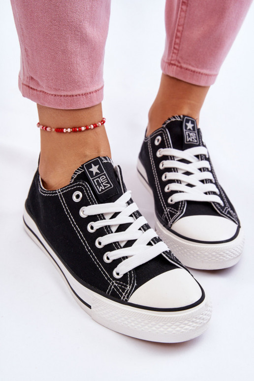 Scarpe per il tempo libero modello classico di colore nero con suola bianca Ecoma