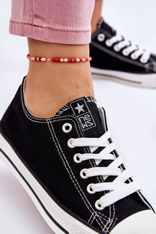 Scarpe per il tempo libero modello classico di colore nero con suola bianca Ecoma